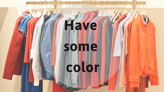 colourful shirts hanging on a rack