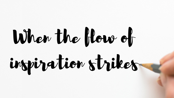 fingers holding a pencil