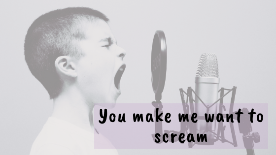 boy screaming into a mic