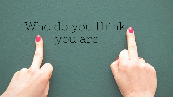 two red nails middle fingers on table